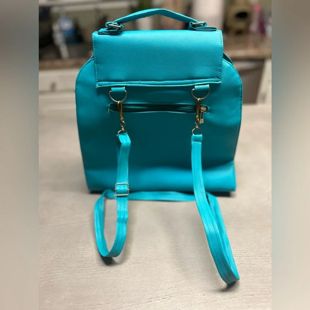 Okpta Mirabel Backpack/ Purse/ Handbag‎ With Disney Encanto Character.